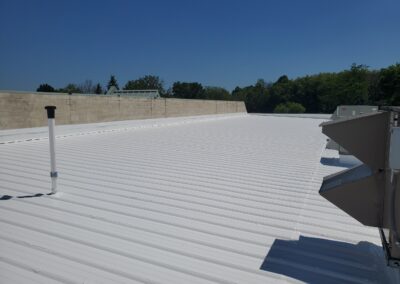Roof coating for a strip mall